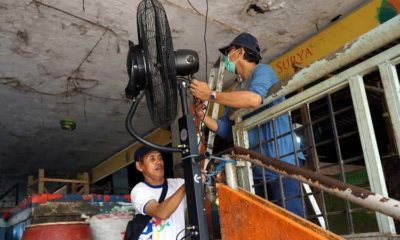 Cegah Covid-19, PD Pasar Surya Pasang Kipas Semprot Disinfektan di Pasar Keputran Utara